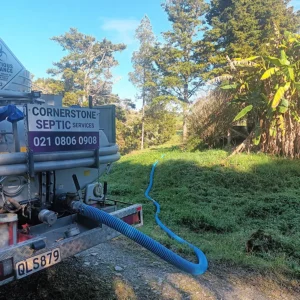 Cornerstone Septic Services carrying out septic tank cleaning at a property in Kawakawa.