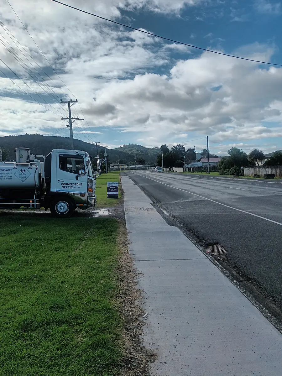 Cornerstone Septic Services truck pulling out of a driveway in Moerewa, Northland