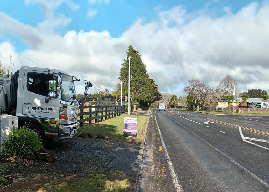 Cornerstone Septic Services truck leaving a driveway on Guy Road, Kaikohe